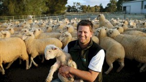 Picture of farmer with his sheep